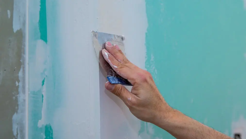 how professional painters prepare interior walls before painting