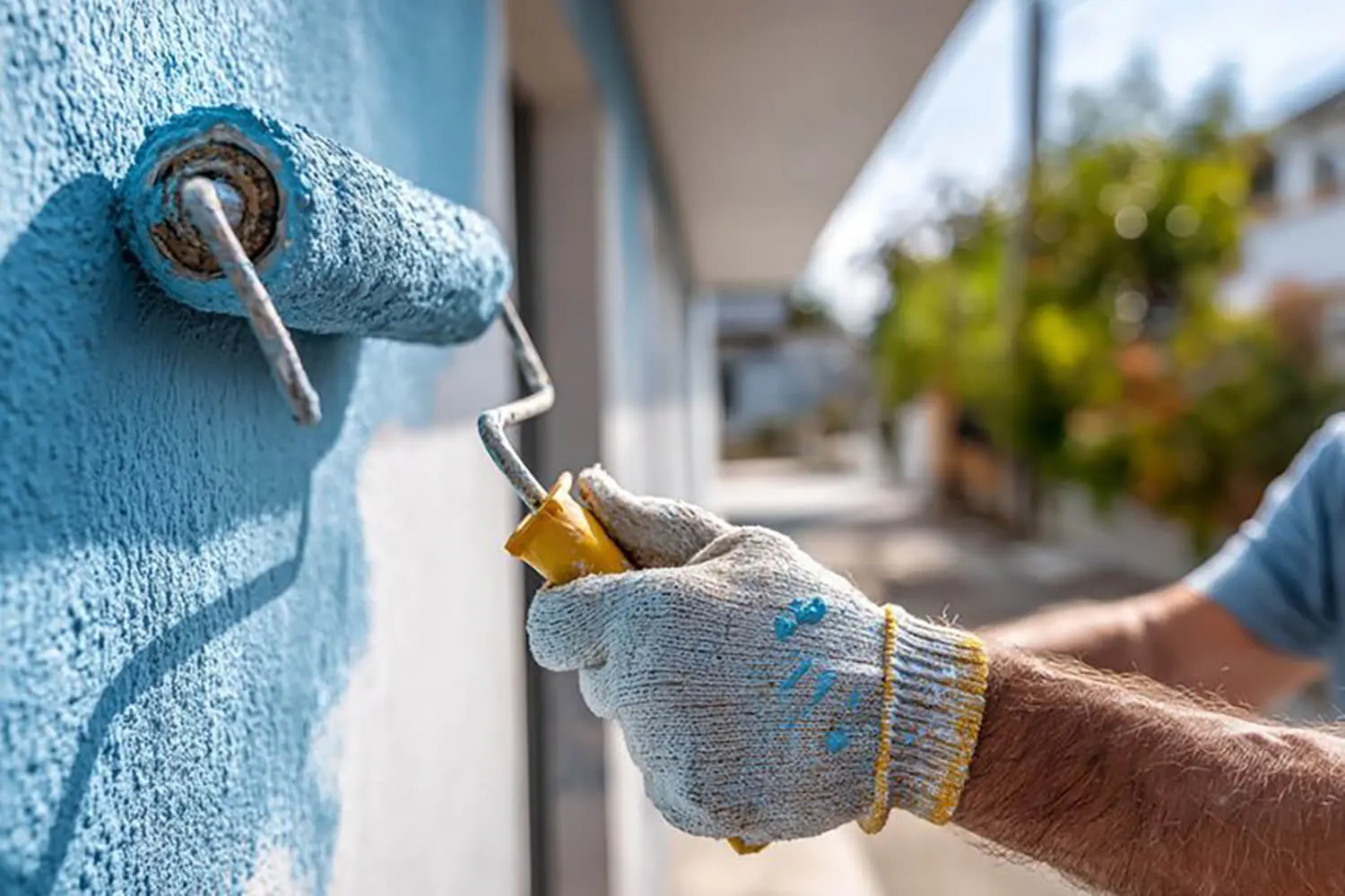 Exterior house painting showing proper application while explaining what causes exterior paint to fail prematurely