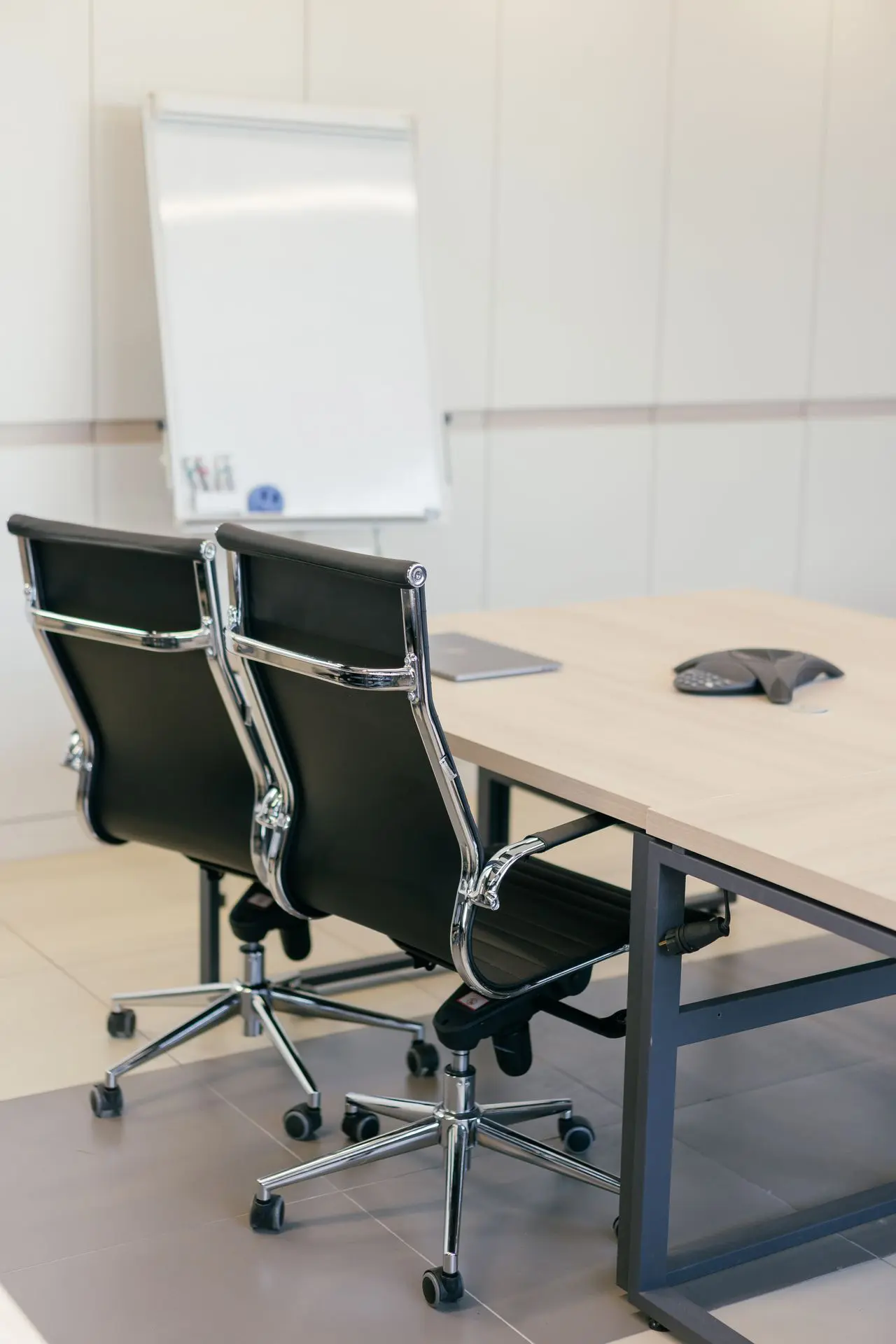 Office meeting area with chairs and whiteboard in Whitby, ON