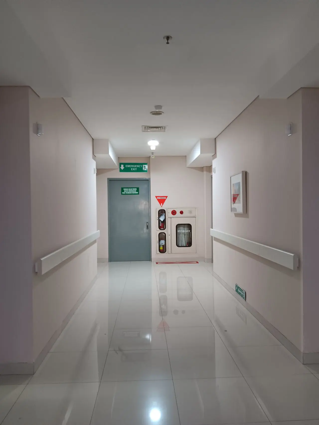 Freshly painted hospital corridor with handrails in Whitby, ON
