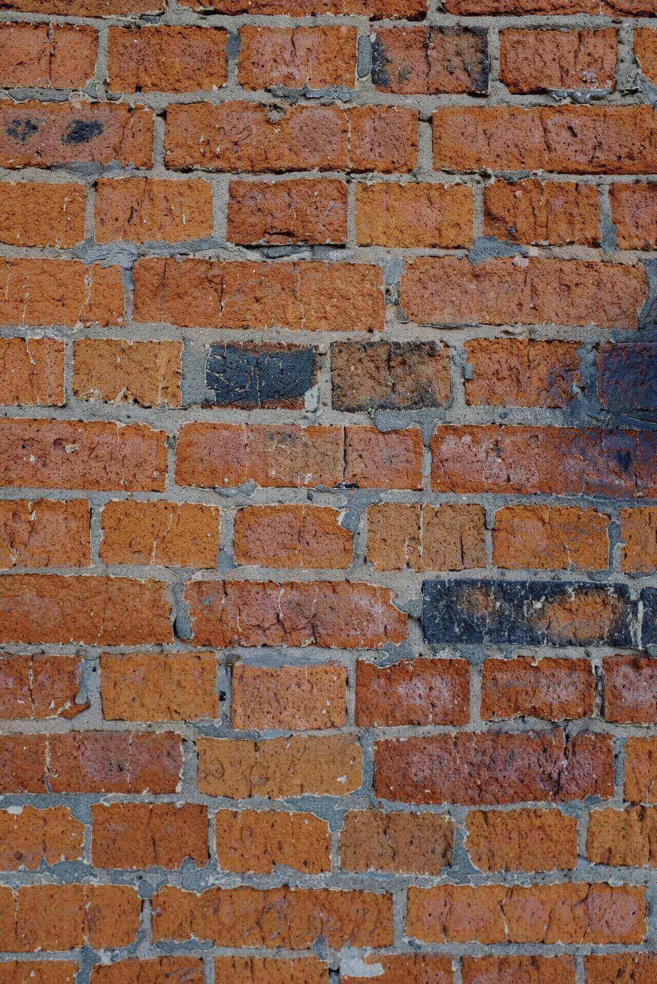 Close-up brick wall texture with mortar joints in Whitby, ON