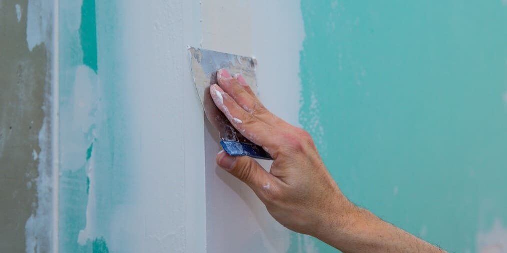 how professional painters prepare interior walls before painting