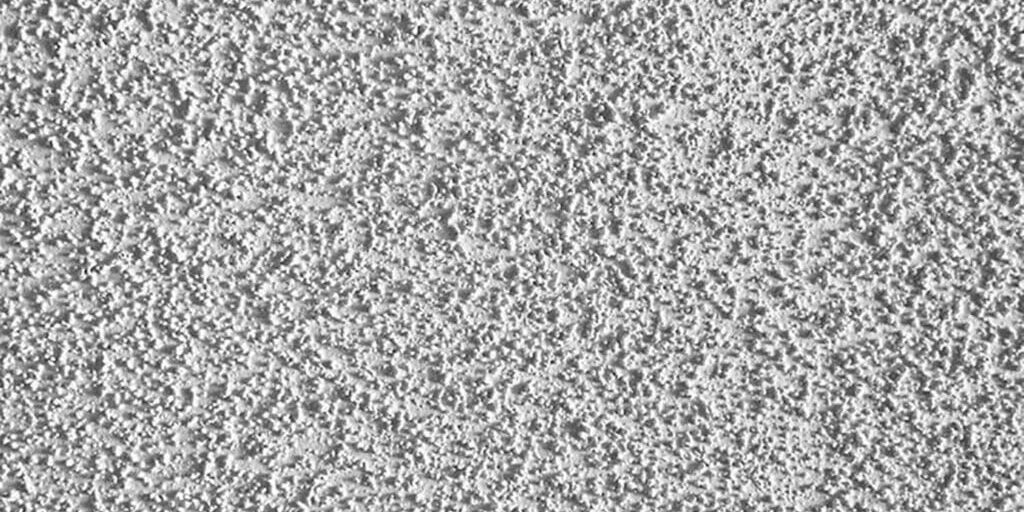Close-up of a textured popcorn ceiling surface showing why spring is a good time for popcorn ceiling removal in Whitby homes
